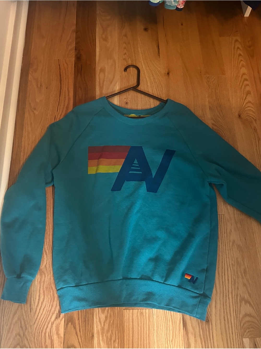 Aviator Nation Teal Crewneck Sweatshirt with Blue Logo and Rainbow Stripe